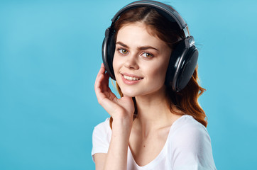 Fototapeta premium young woman listening to music with headphones