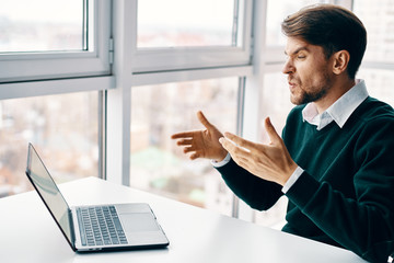 businesswoman working on laptop in office