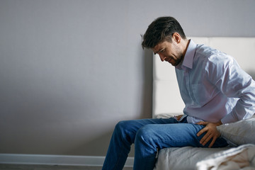 man sitting on the floor