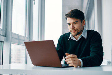 businessman working on laptop in office