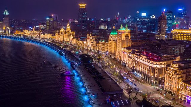 Aerial view Shanghai at night  The Bund, The Bund in Shanghai is a famous waterfront area in central Shanghai at night, China, Aerial hyperlapse video 4K.