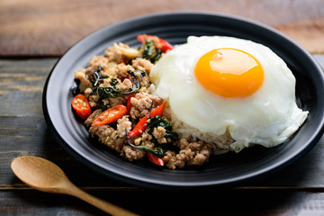 Thai food (Pad Kaprao Moo Kai Dao), stir-fried holy basil with minced pork and fried egg