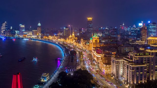 Aerial view Shanghai at night  The Bund, The Bund in Shanghai is a famous waterfront area in central Shanghai at night, China, Aerial hyperlapse video 4K.
