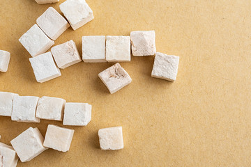 Poria cochinensis on yellow paper