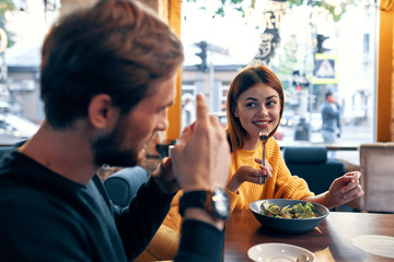 young couple having dinner in restaurant