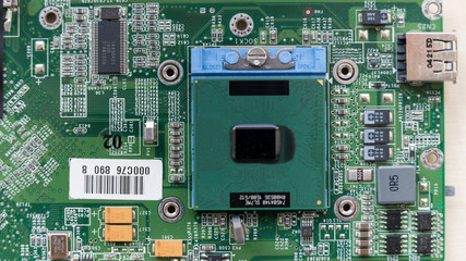 Processor on laptop motherboard in detail.
