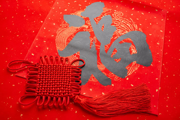 Chinese new year new year blessings and wishful knot red background material