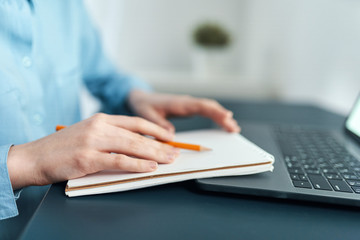 woman using digital tablet in office