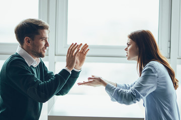 business man and woman shaking hands