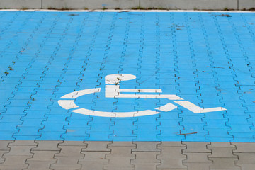 blue parking spot for handicap people