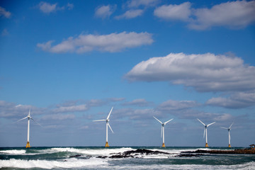 wind turbine on blue sky