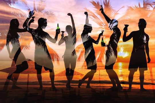 tropical beach party, group of young people dancing, friends drinking beer and cocktails at sunset