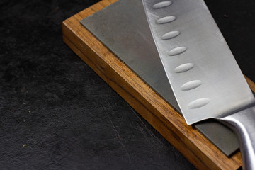 knife on sharpening stone