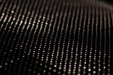 metal mesh texture,black dark background, material pattern