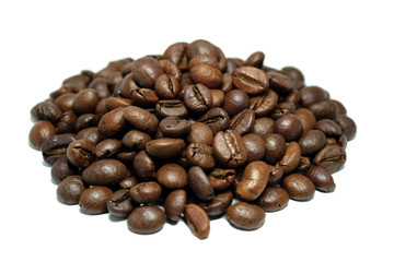 Bunch of coffee beans on a white background.