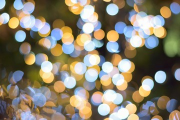 Obraz premium Colorfu texture of Chritmas illumination LED light blurs