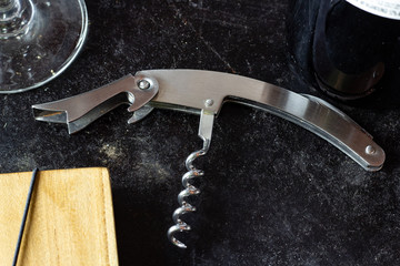 corkscrew with notebook