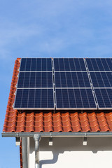 solar panels on a rooftop of a new building
