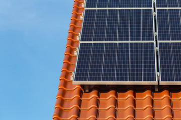 solar panels on a rooftop of a new building