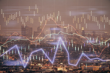 Financial graph on night city scape with tall buildings background double exposure. Analysis concept.