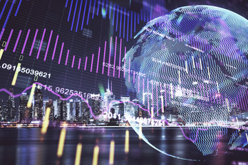 Financial graph on night city scape with tall buildings background multi exposure. Analysis concept.