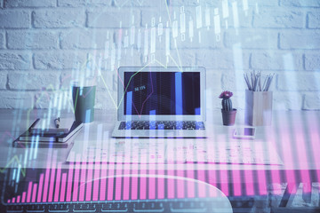 Forex market chart hologram and personal computer background. Double exposure. Concept of investment.