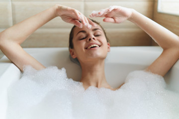 woman relaxing in bubble bath