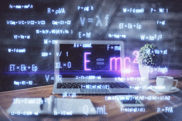 Desktop computer background and formula hologram writing. Double exposure. Education concept.