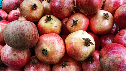 Colorful fresh and organic Pomegranate at the fruit market counter in Istanbul, Turkey