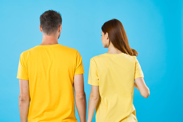 Fototapeta premium young couple in t-shirts chatting
