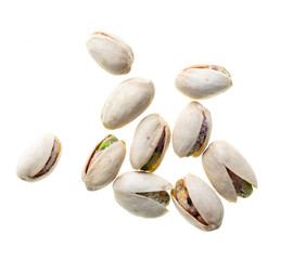 Ripe pistachios nuts isolated on a white background