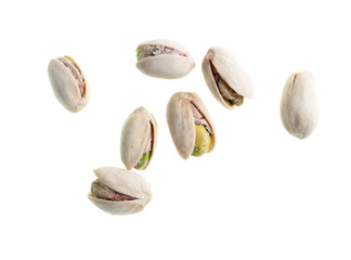 Ripe pistachios nuts isolated on a white background