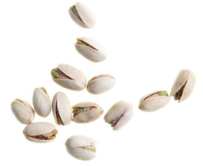 Ripe pistachios nuts isolated on a white background