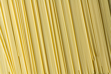 Fresh uncooked spaghetti background
