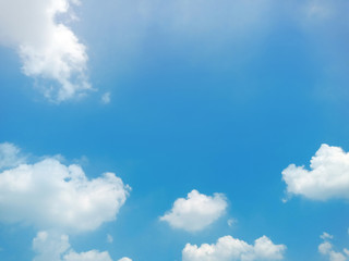 Fototapeta premium Blue sky background with white clouds.