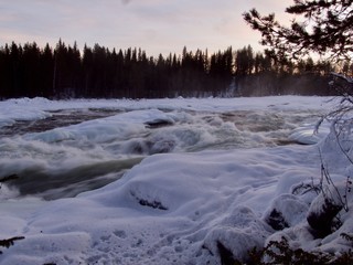 winter landscape, waterfall Storforsen in the North