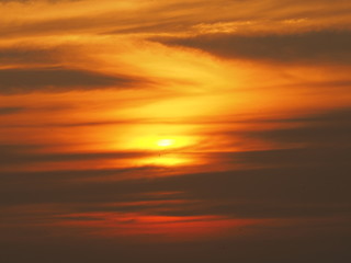 Naklejka na ściany i meble Twilight dusk. Sunset orange sky clouds. Beautiful sky.