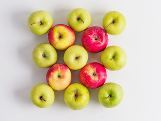 Top view of organic apples isolated on white background.