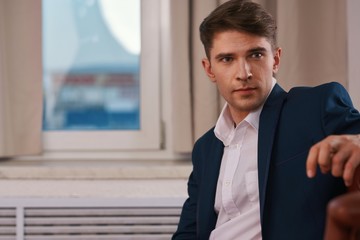 Fototapeta premium portrait of a businessman in front of office building