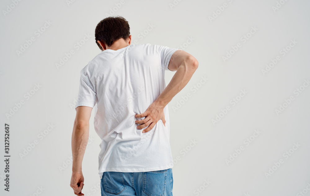 Wall mural man with back pain - Wall murals