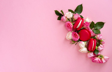 Floral composition with a wreath of pink roses on pink background. Valentine's Day background. Flat lay, top view.