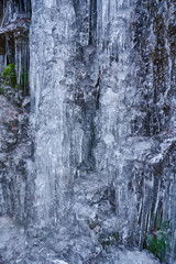Fototapeta na wymiar Icicles from a frozen waterfall