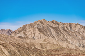 Fototapeta premium barren mountains on rocky desert landscape