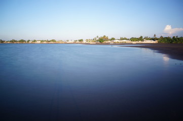 the beach in the afternoon when the tide is low