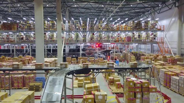 Warehouses large logistics commerce structure with boxes on the shelf