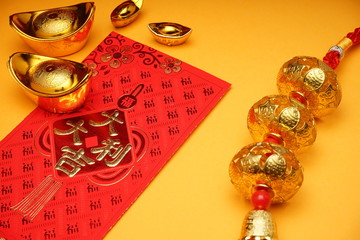 Chinese New Year decorations with yellow background with assorted festival decorations. Chinese...