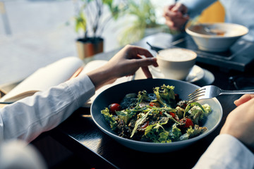 woman preparing salad in the kitchen