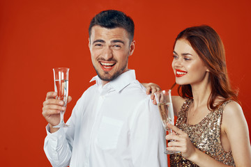 young couple celebrating with champagne