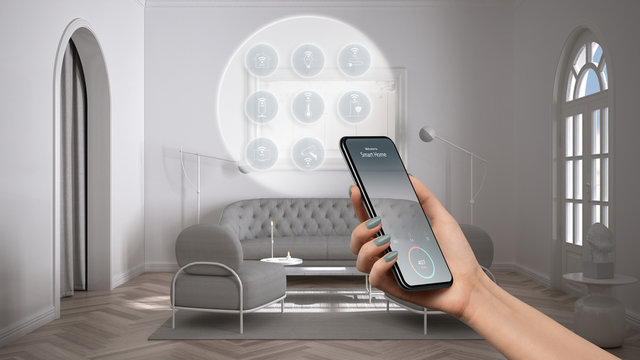 Smart home technology interface on phone app, augmented reality, internet of things, interior design of classic lounge with connected objects, woman hand holding remote control device