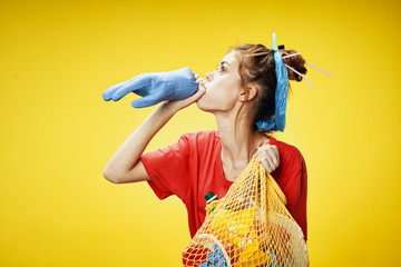 Fototapeta premium Woman with trash bags